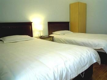 Juranzhijia Business Hotel Цзинань Экстерьер фото