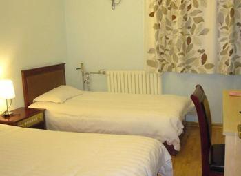 Juranzhijia Business Hotel Цзинань Экстерьер фото