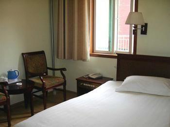 Juranzhijia Business Hotel Цзинань Экстерьер фото